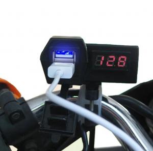 На фото Зарядное устройство на руль UZB-Вольтметр 12v